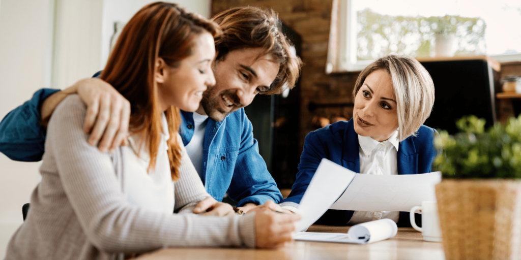 Couple discussing Insurance with the advisor- Insure canada